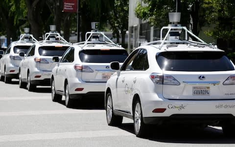 Picture shows a row of driverless cars being developed by Google - Credit: Eric Risberg/AP