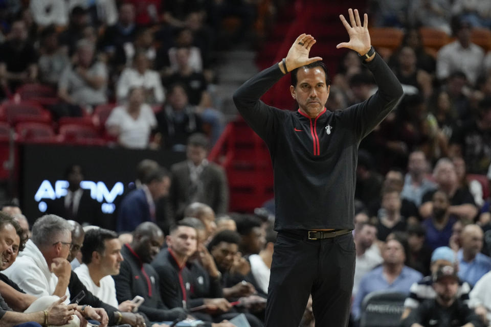 Miami Heat head coach Erik Spoelstra gestures to his team during the first half of an NBA basketball game against the Brooklyn Nets, Thursday, Nov. 16, 2023, in Miami. (AP Photo/Rebecca Blackwell)