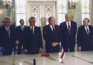 FILE - Russia's President Boris Yeltsin, second right, Ukraine's President Leonid Kravchuk, second left, Ukraine's Prime Minister Vitold Fokin, left, Belarus' leader Stanislav Shushkevich, third right, and Belarus' Prime Minister Vyacheslav Kebich, right, stand after signing an agreement terminating the Soviet Union and declaring the creation of the Commonwealth of Independent States in Viskuli, Belarus, on Dec. 8, 1991. The agreement dealt the final deadly blow to the Soviet Union. (AP Photo/Yuri Ivanov, File)