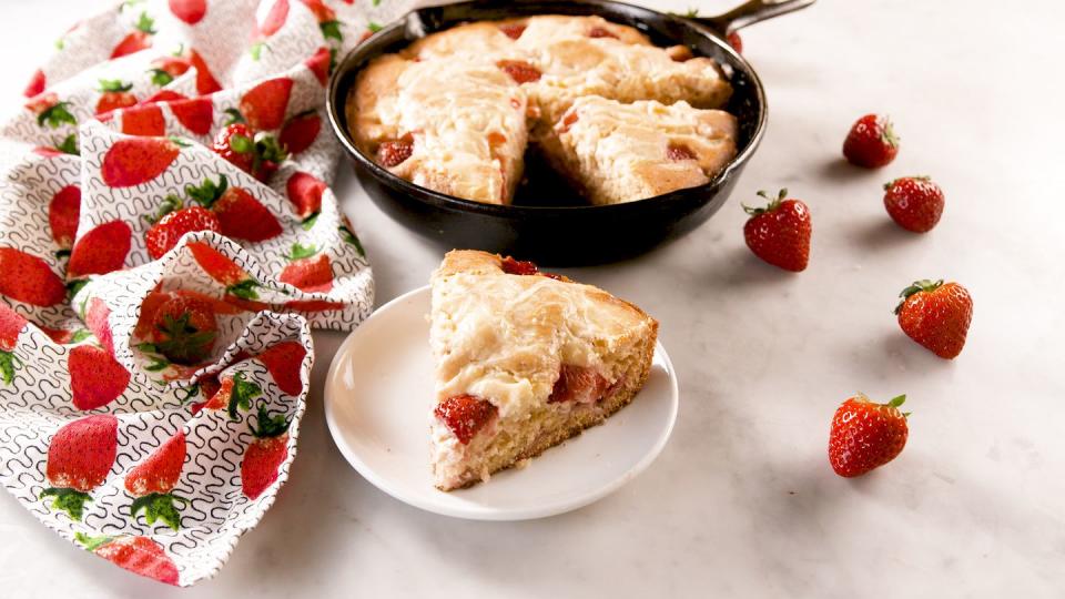 <p>This fluffy, moist cake will be gone in minutes.</p><p>Get the recipe from <a href="https://www.delish.com/cooking/recipe-ideas/a27103689/strawberry-cheesecake-skillet-cake-recipe/" rel="nofollow noopener" target="_blank" data-ylk="slk:Delish;elm:context_link;itc:0;sec:content-canvas" class="link ">Delish</a>.</p>