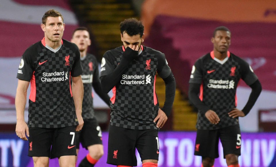 Soccer Football - Premier League - Aston Villa v Liverpool - Villa Park, Birmingham, Britain - October 4, 2020. Liverpool's Mohamed Salah and James Milner look dejected after conceding their seventh goal. Pool via REUTERS/Rui Vieira EDITORIAL USE ONLY. No use with unauthorized audio, video, data, fixture lists, club/league logos or 'live' services. Online in-match use limited to 75 images, no video emulation. No use in betting, games or single club /league/player publications.  Please contact your account representative for further details.     TPX IMAGES OF THE DAY