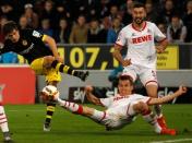 Football Soccer - Borussia Dortmund v Cologne - German Bundesliga - RheinEnergie Stadion , Cologne, 19/12/15 Borussia Dortmund's Jonas Hofmann in action with Cologne's Pawel Olkowski and Dominic Maroh. REUTERS/Ina Fassbender