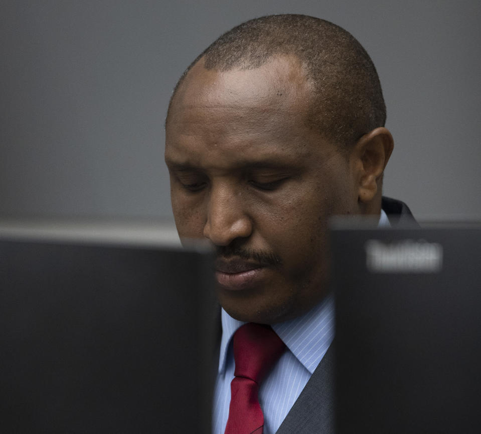 Congolese militia commander Bosco Ntaganda enters the courtroom of the International Criminal Court, or ICC, to hear the sentence in his trial in The Hague, Netherlands, Thursday, Nov. 7, 2019. The ICC delivered the sentence on Ntaganda, accused of overseeing the slaughter of civilians by his soldiers in the Democratic Republic of Congo in 2002 and 2003. (AP Photo/Peter Dejong, Pool)