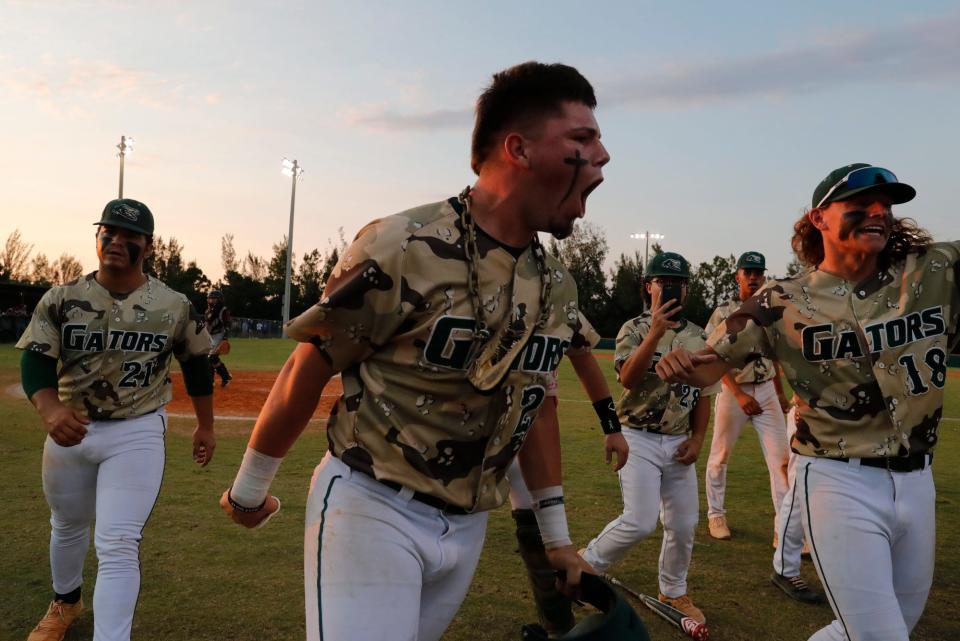 Jake Mueller celebrates after a solo home run. The Island Coast Gators baseball team defeated Miami Springs 4-1 in the  Class 4A-Region 4 Championship game Tuesday, May 17, 2022. The Gators move on to the state semi-finals game. 