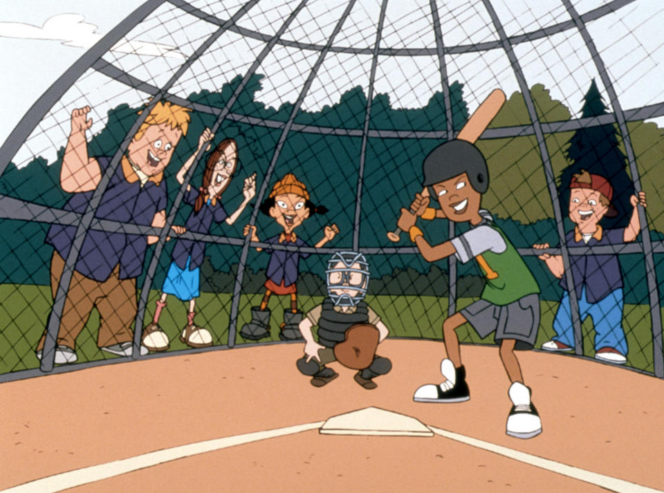 Mickey, Gretchen, Spinelli, and TJ cheer on Vince as he's up to bat while Gus plays catcher