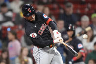 Cleveland Guardians' Gabriel Arias hits an RBI single in the tenth inning of a baseball game against the Boston Red Sox, Tuesday, April 16, 2024, in Boston. (AP Photo/Steven Senne)