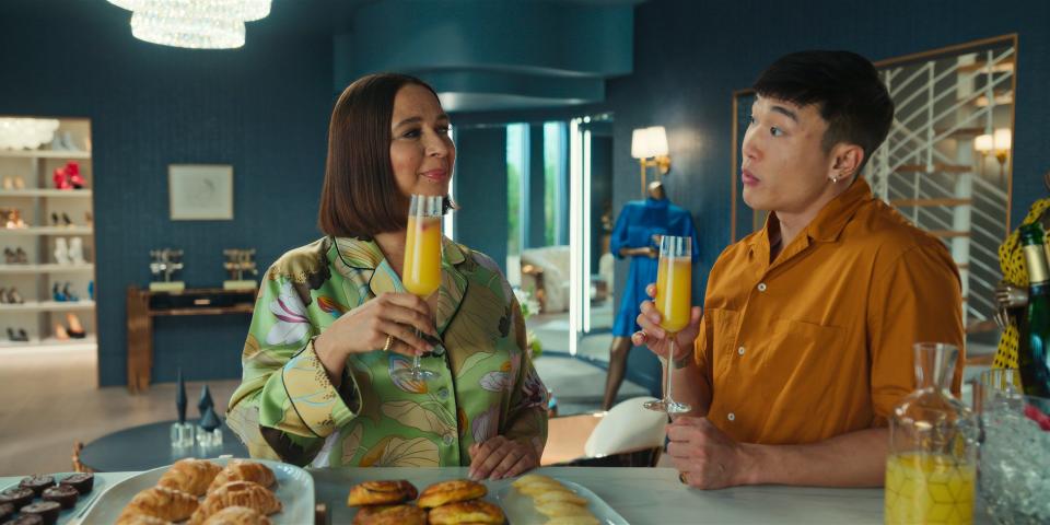 Maya Rudolph, left, and Joel Kim Booster spoof the uber-rich in Apple TV+ comedy "Loot."