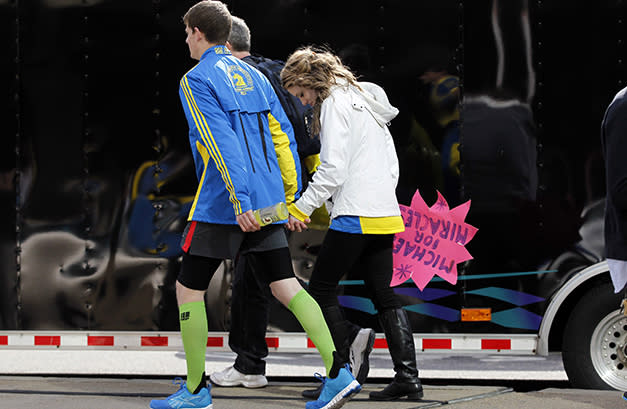 People leave after explosions at the Boston Marathon (Jessica Rinaldi/Reuters)