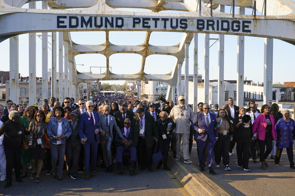 President Joe Biden walks across the Edmund Pettus Bridge in Selma, Ala., Sunday, March 5, 2023, to commemorate the 58th anniversary of "Bloody Sunday," a landmark event of the civil rights movement. (AP Photo/Patrick Semansky)