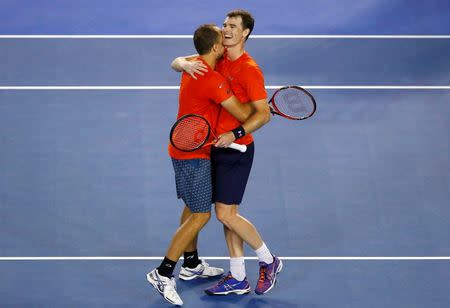Britain's Jamie Murray (R) and Brazil's Bruno Soares celebrate after winning their doubles final match at the Australian Open tennis tournament at Melbourne Park, Australia, January 31, 2016. REUTERS/Jason O'Brien Action Images via Reuters