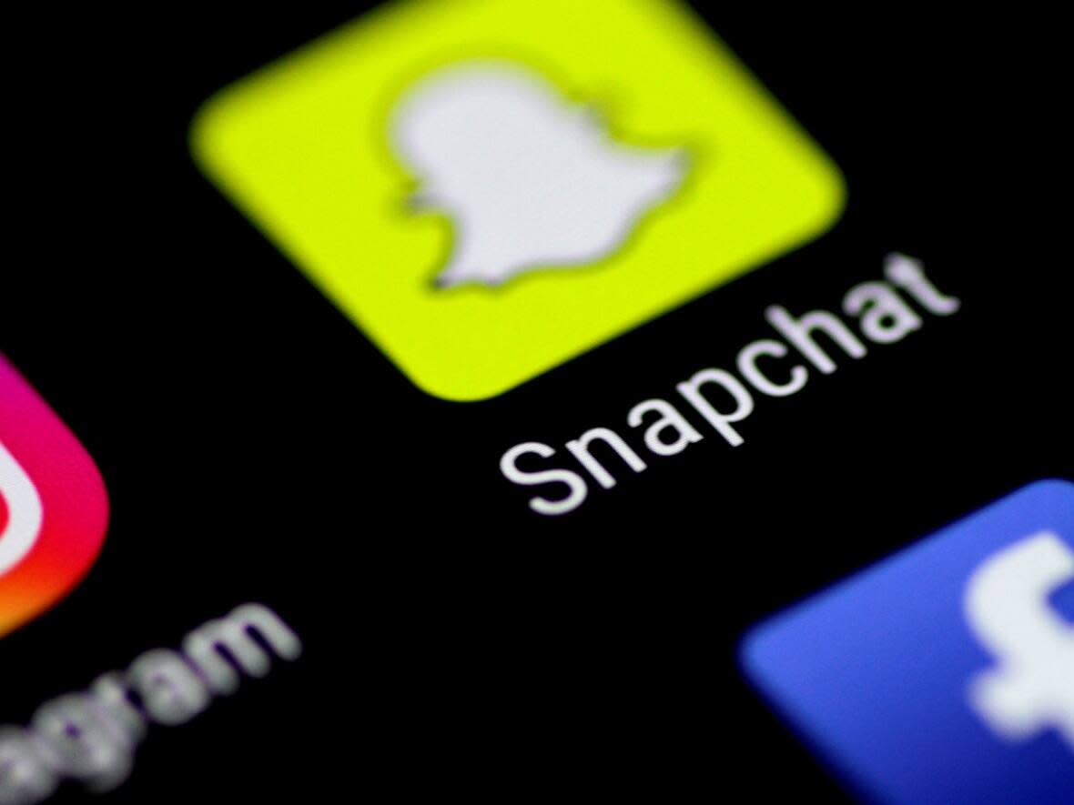 A Whitecourt man has admitted to using Snapchat to lure several children for sexual purposes.    (Thomas White/Reuters - image credit)