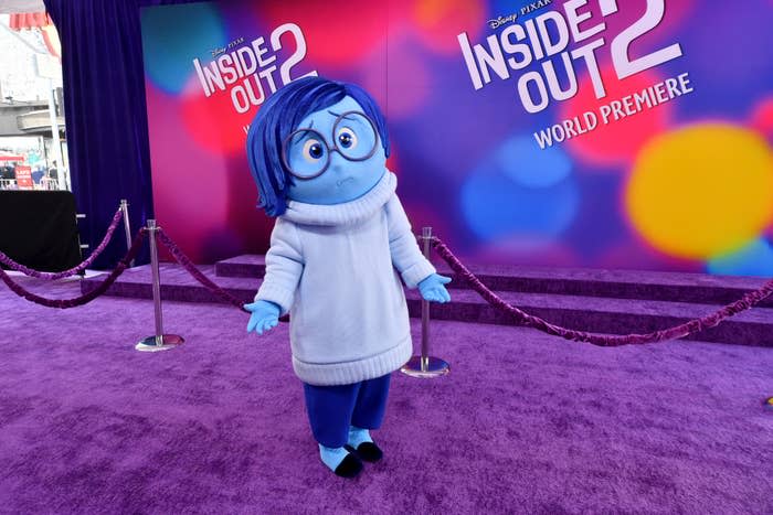 Sadness, a blue character from Disney Pixar's Inside Out 2, poses at the movie's world premiere