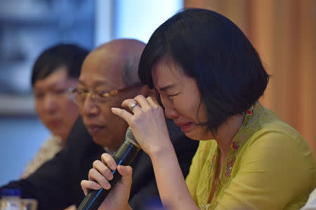 Veronica Tan, the wife of former Jakarta governor, Basuki Tjahaja Purnama, popularly known as "Ahok", weeps during a news conference in Jakarta May 23, 2017 in this photo taken by Antara Foto. Antara Foto//Wahyu Putro A/via REUTERS