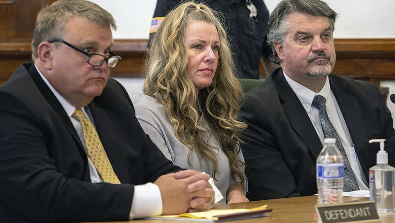 Lori Vallow Daybell, center, sits between her attorneys for a hearing at the Fremont County Courthouse in St. Anthony, Idaho, in this Aug. 16, 2022, file photo.