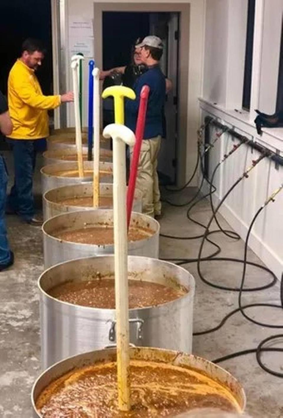 Members of the Episcopal Church of the Ascension in Hattiesburg prepared more than 1,000 quarts of gumbo in January. The gumbo is said to be ready when the stirring paddles stand up in the center of the gumbo.