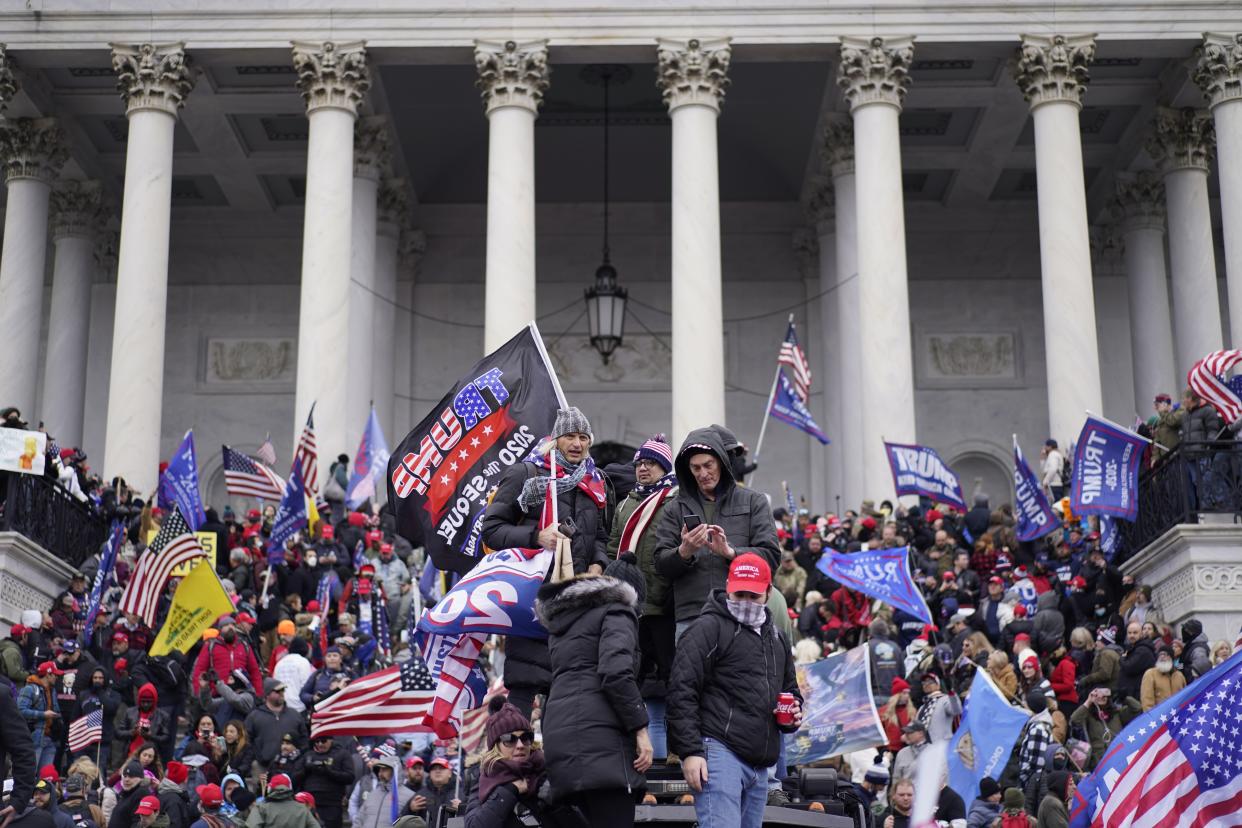 WASHINGTON, DC - JANUARY 06:  Protesters gather storm the Capitol and halt a joint session of the 117th Congress on Wednesday, Jan. 6, 2021 in Washington, DC. (Kent Nishimura / Los Angeles Times via Getty Images)