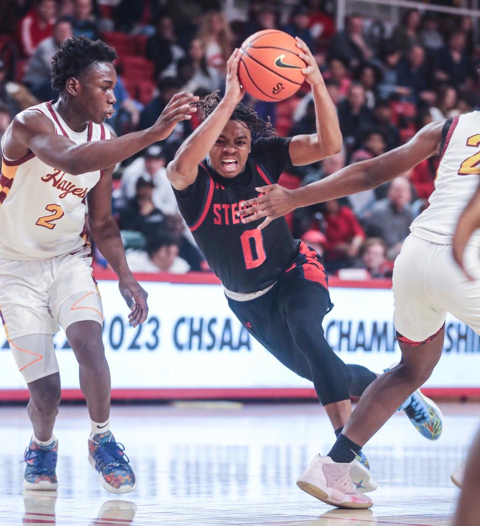 Danny Carbuccia of Stepinac drives against Cardinal Hayes during the Class AA CHSAA Basketball Championship at St. JohnÕs University in Queens March 12, 2023. Stepinac defeated Cardinal Hayes 69-66 to win the championship. 