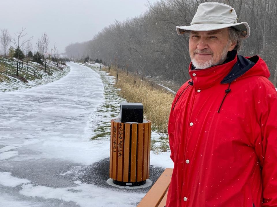 Roger Jochym is a member of a group that has been fighting to protect and promote the natural beauty of an escarpment known locally as the Falaise Saint-Jacques. (Simon Nakonechny/CBC - image credit)