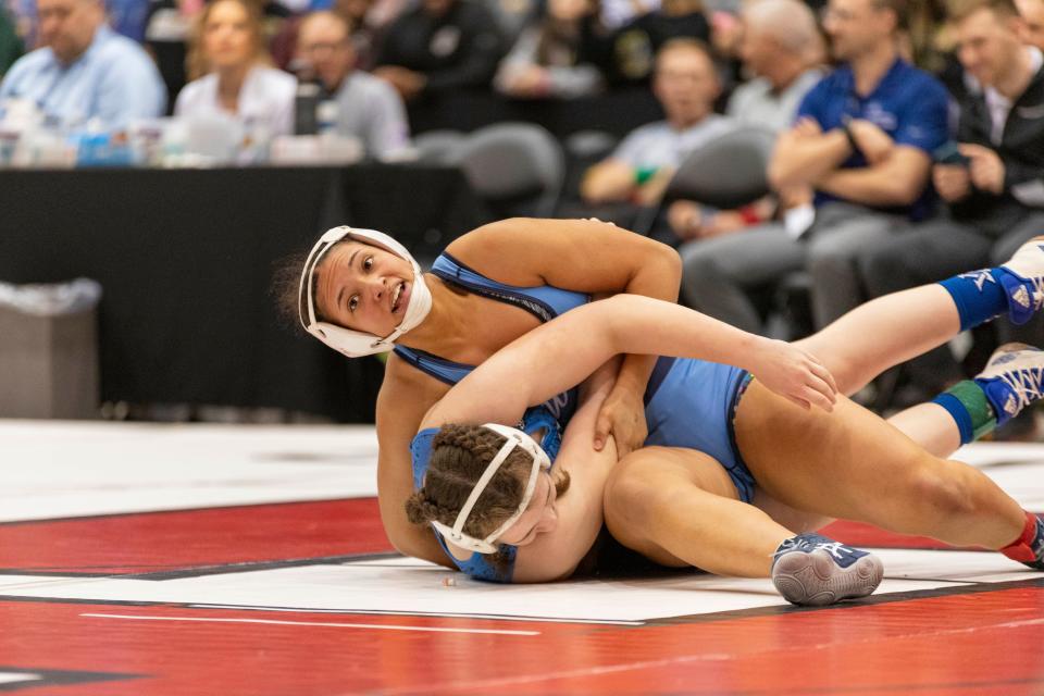 Washburn Rural's TaAni Rhoten tries to pin Leavenworth's Jacqueline Goodman at 6-5A Girls State Wrestling on Saturday, Feb. 24, 2024.