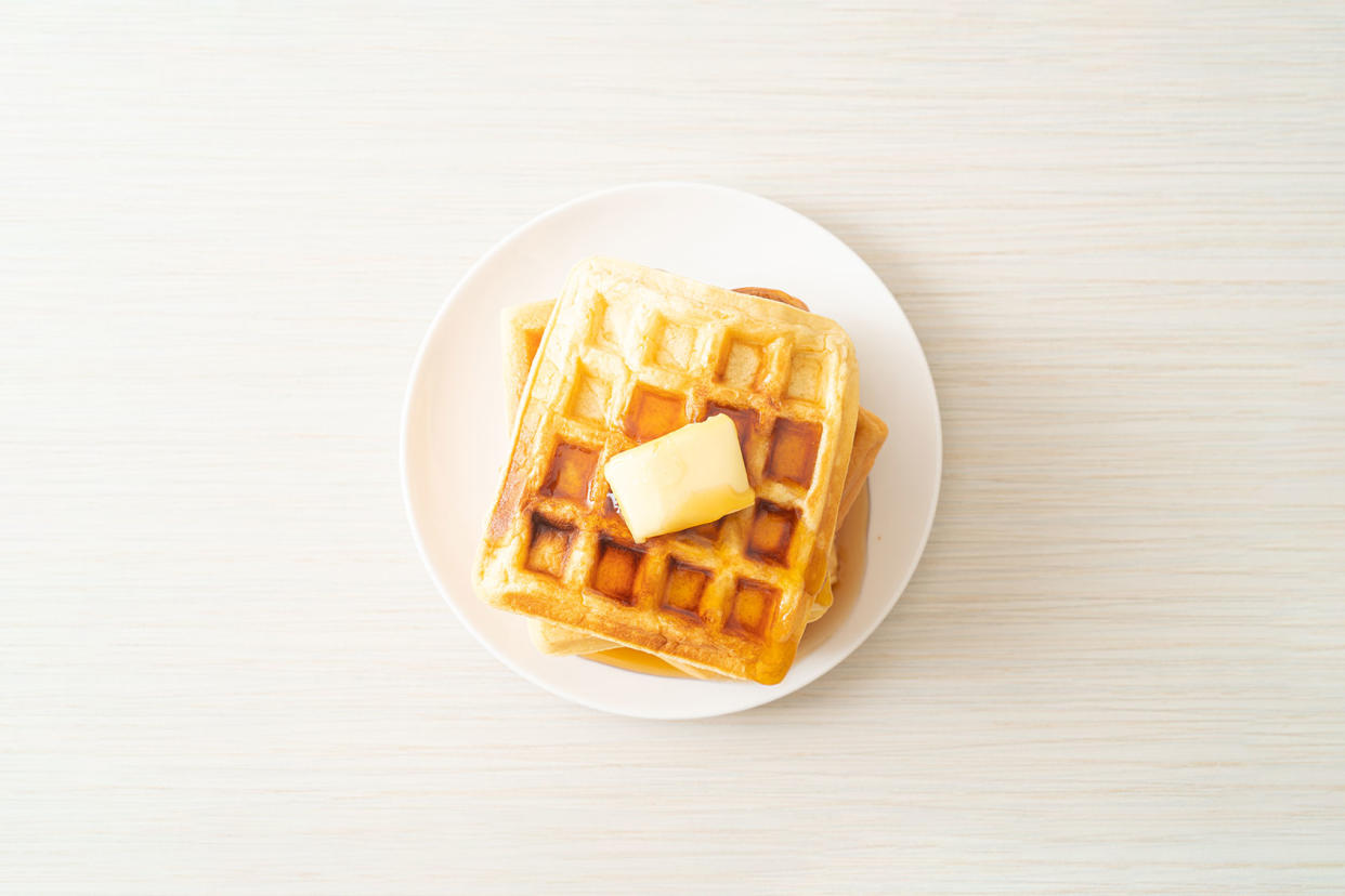 Waffle stack with butter and honey Getty Images / Ania Todica / 500px