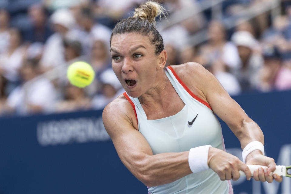 Seen here, Simona Halep returning a ball during her first round match against Daria Snigur at the US Open in 2022. 