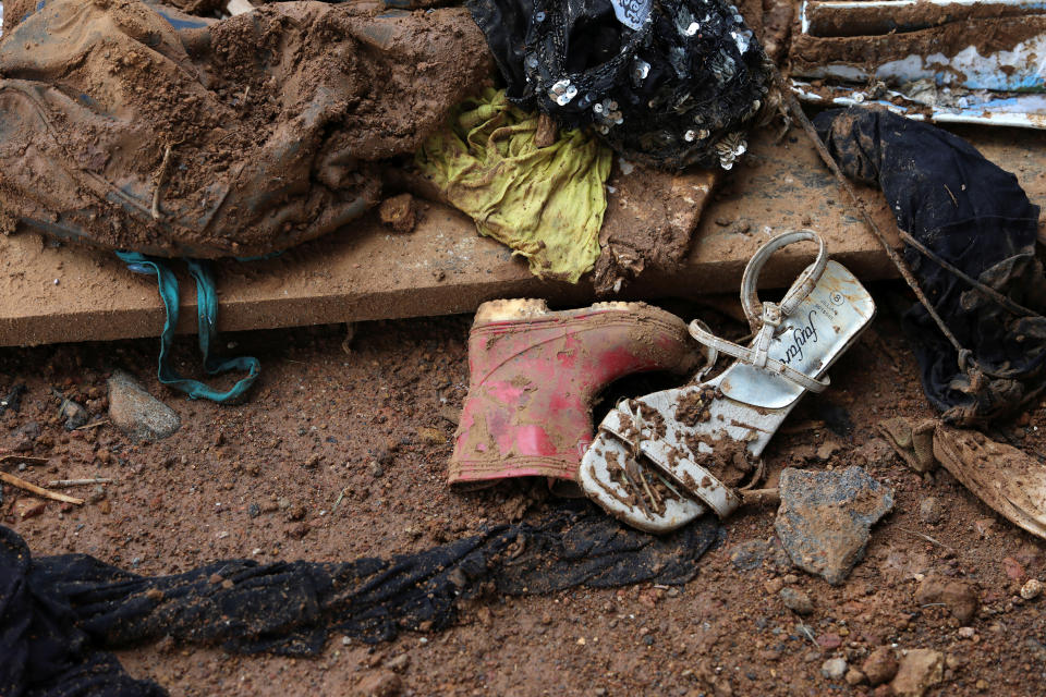 <p>Shoes left after a flash flood during the mudslide at Pentagon, in Freetown, Sierra Leone on Aug. 18, 2017. (Photo: Afolabi Sotunde/Reuters) </p>