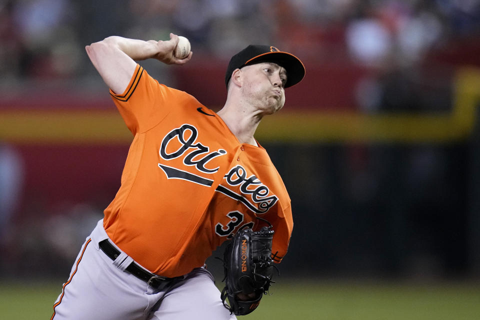 Baltimore Orioles starting pitcher Kyle Bradish throws to an Arizona Diamondbacks batter during the first inning of a baseball game Saturday, Sept. 2, 2023, in Phoenix. (AP Photo/Ross D. Franklin)