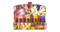 A mini-scent wardrobe containing eight different fragrances from Floral Street for the indecisive in your life. The set includes London Poppy, Wonderland Peony, Neon Rose, Wild Vanilla Orchid, Iris Goddess, Chypre Sublime, Black Lotus and Ylang Ylang Espresso. <a href="https://fave.co/31ewQBL" rel="noopener" target="_blank" data-ylk="slk:Shop now;elm:context_link;itc:0;sec:content-canvas" class="link ">Shop now</a>.