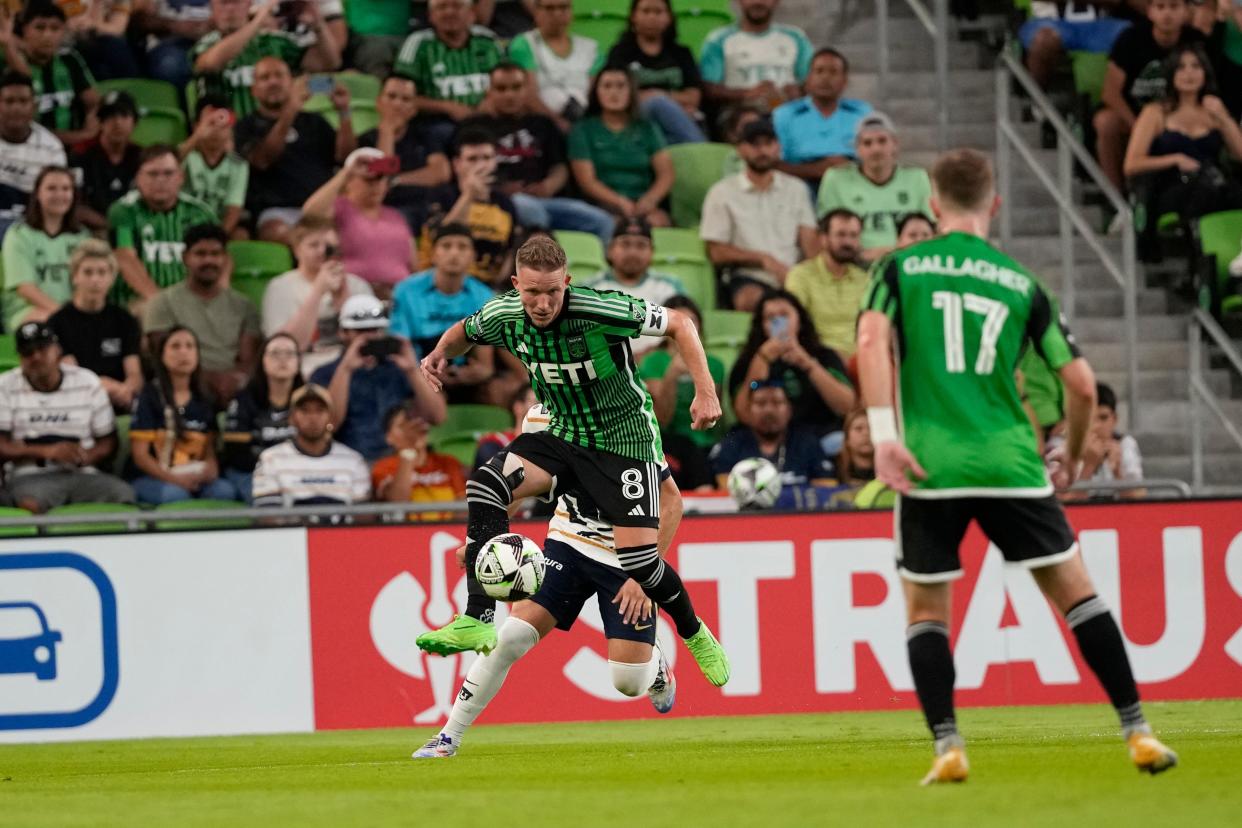 July 26, 2024;  Austin, Texas, USA;  Austin FC midfielder Alexander Ring (8) jumps to control the ball during the first half against Pumas CU at Q2 Stadium.  Mandatory Credit: Scott Wachter-USA TODAY Sports