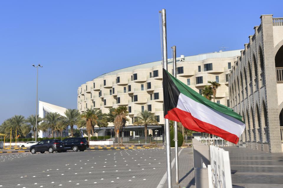 Kuwait national flag is in half mast after the death of the Emir of Kuwait Sheikh Nawaf Al Ahmad Al Sabah, in Kuwait, Saturday, Dec. 16, 2023. Kuwait's ruling emir, the 86-year-old Sheikh Nawaf Al Ahmad Al Sabah, died Saturday after a three-year, low-key reign focused on trying to resolve the tiny, oil-rich nation's internal political disputes. (AP Photo/Jaber Abdulkhaleg)
