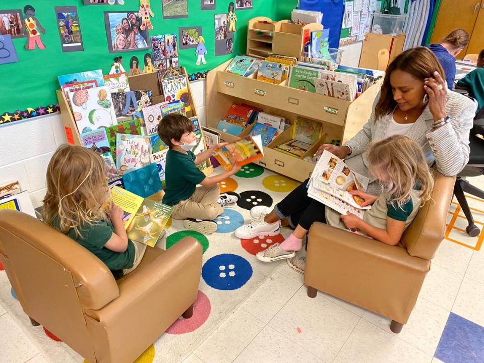 Pre-K students read at Charles Drew Charter School.