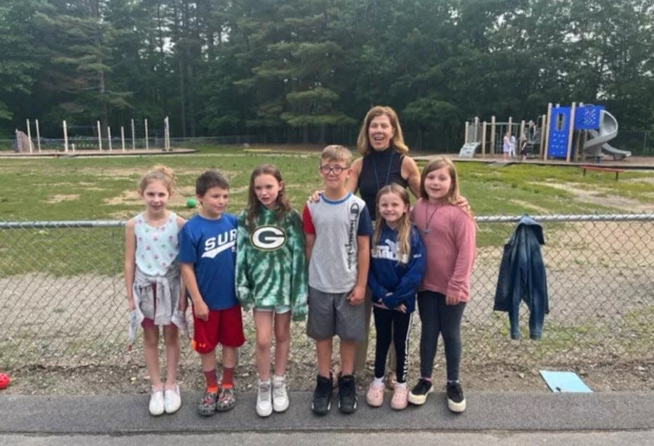 Gonic School third graders (from left) Khloe, Will Bailey, Willow Pierce, Lucas Strydom, Delainy Robbins, and Molly MacDonald with Reading Specialist Kate Snow.