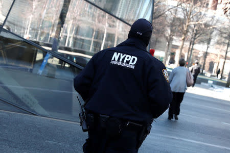 A New York City Police (NYPD) Counterterrorism officer patrols near the World Trade Center in New York City, New York, U.S, March 22, 2017. REUTERS/Mike Segar