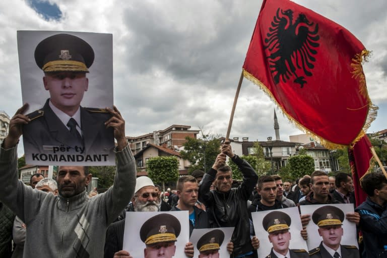 Kosovo Albanians show support for jailed ex-Kosovo Liberation Army commander Sylejman Selimi, sentenced for torturing prisoners, and opposition to the EU-backed court that tried former fighters with varying degrees of success