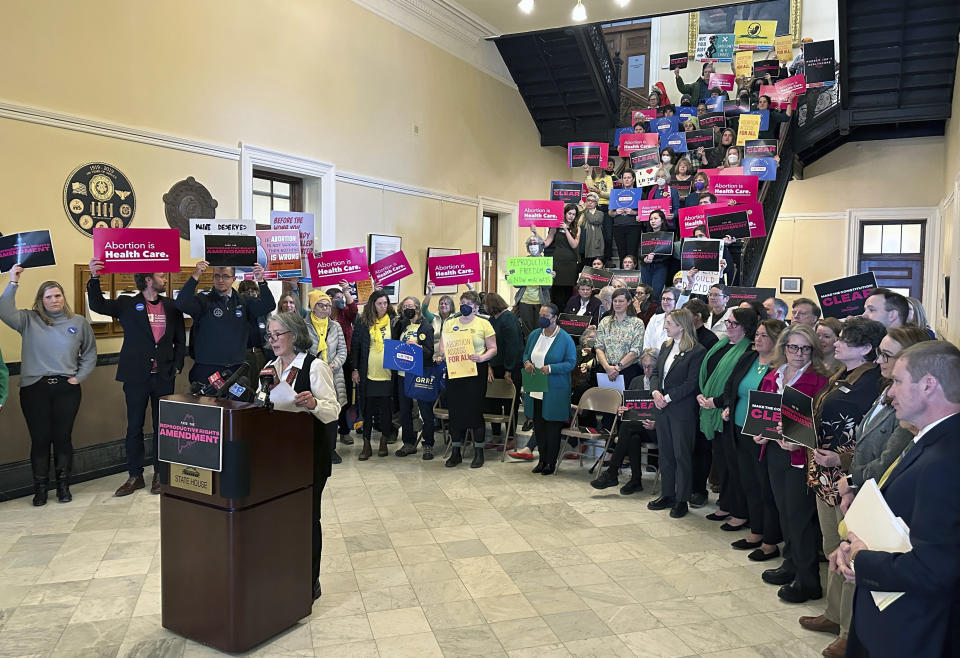 Democratic Maine Sen. Eloise Vitelli, sponsor of a proposal to amend the Maine Constitution to enshrine the right to an abortion, addresses supporters in the Hall of Flags at the Maine State House on Monday, Jan. 22, 2024, in Augusta, Maine. (AP Photo/David Sharp)