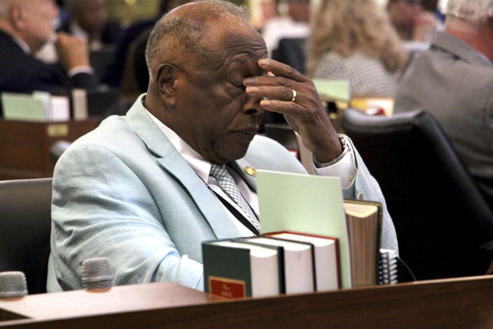 North Carolina state Rep. Marvin Lucas, a Cumberland County Democrat, reacts to the House's vote to override the Democratic governor's veto of a bill banning gender-affirming health care for minors, Wednesday, Aug. 16, 2023, in Raleigh, N.C (AP Photo/Hannah Schoenbaum)