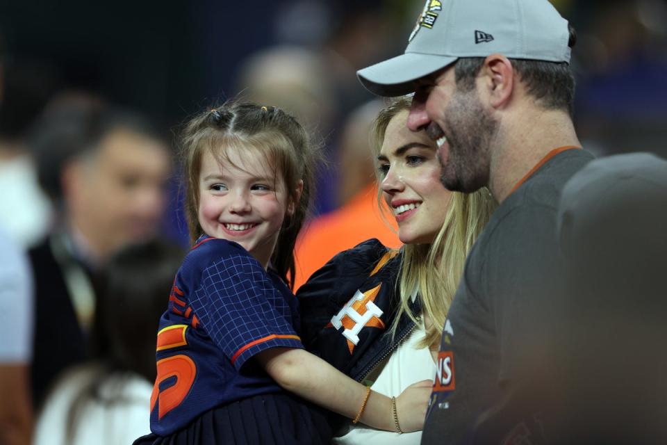 Kate Upton and Justin Verlander pose with three-year-old daughter, Genevieve (Getty Images)