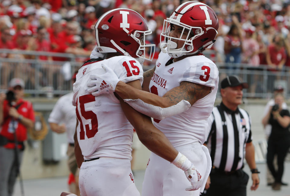 Indiana receiver Nick Westbrook, left, celebrates his touchdown against Ohio State with teammate Ty Fryfogle during the first half of an NCAA college football game Saturday, Oct. 6, 2018, in Columbus, Ohio. (AP Photo/Jay LaPrete)