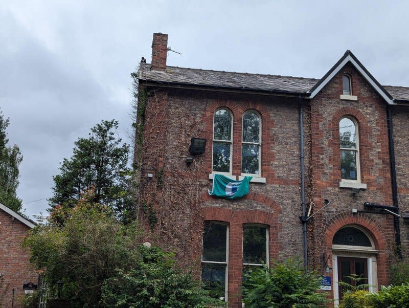 The RSPCA and North West Fire Service teamed up to rescue a kitten trapped on a Cheshire, England, roof. Photo courtesy of the RSPCA