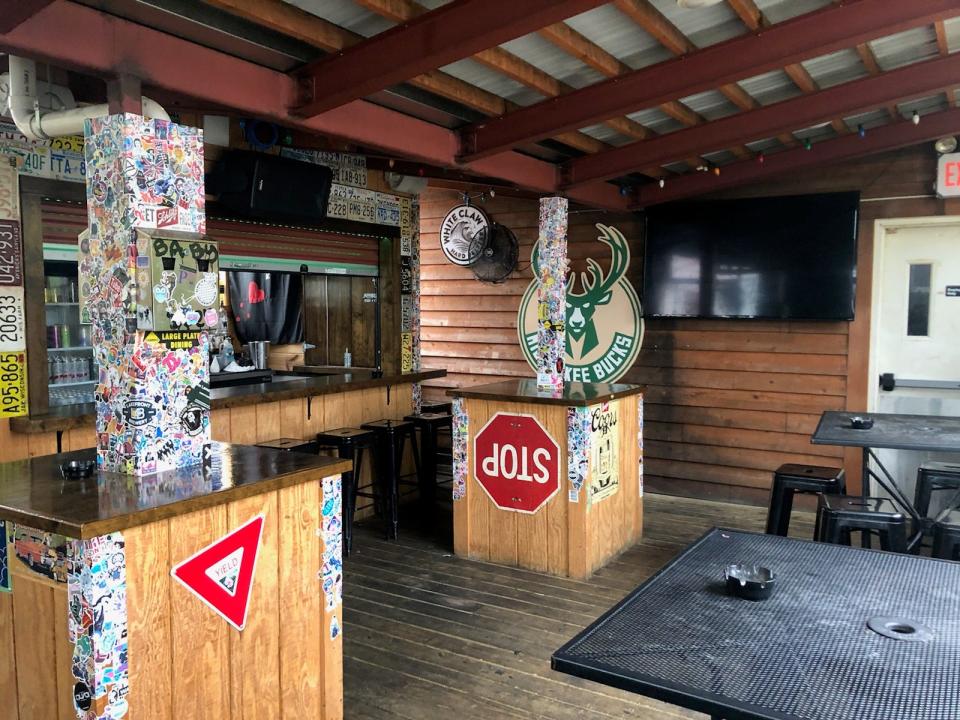 Jack's American Pub has a second level heated patio that is covered and has its own bar