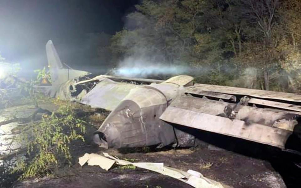 The wreckage of an AN-26 military plane after it crashed in the town of Chuguyiv - Kharkiv Regional State Administration via AP