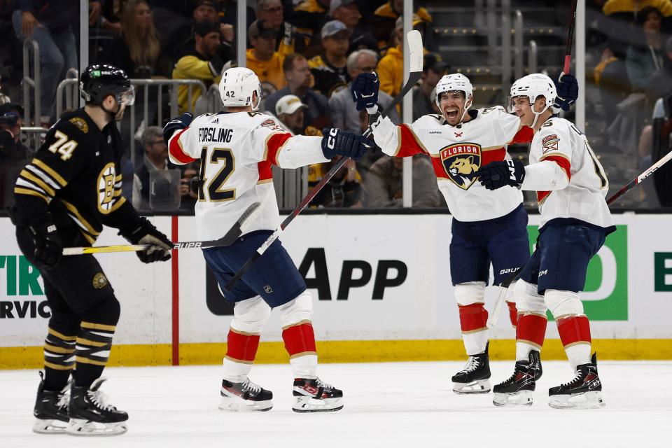 May 10, 2024; Boston, Massachusetts, USA; Florida Panthers center Evan Rodrigues (17) (center) celebrtes his goal with teammates as Boston Bruins left wing Jake DeBrusk (74) skates away during the first period of game three of the second round of the 2024 Stanley Cup Playoffs at TD Garden. Mandatory Credit: Winslow Townson-USA TODAY Sports