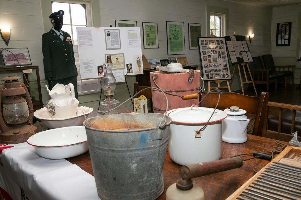 Artifacts sit on display at the Bastrop County African American Cultural Center's Freedom Colonies Museum at the Kerr Community Center on Friday, June 17, 2022. 