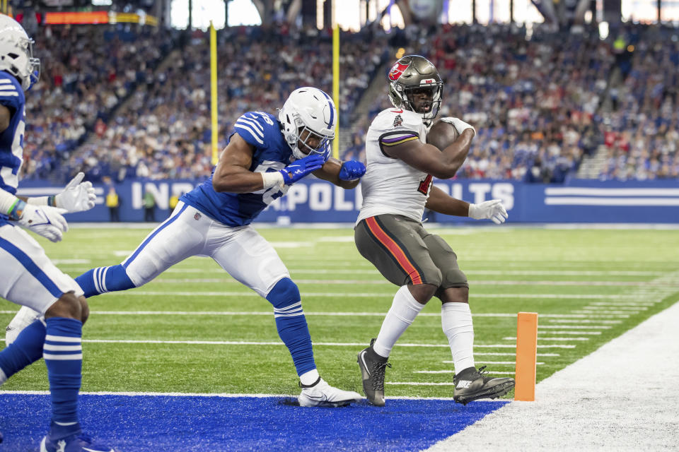 Running back (7) Leonard Fournette of the Tampa Bay Buccaneers scores a touchdown against the Indianapolis Colts in an NFL football game, Sunday, Nov. 28, 2021, in Indianapolis, IN. (AP Photo/Jeff Lewis)