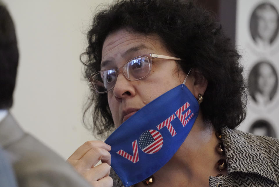 State Rep. Celia Israel, D-Austin, listens to fellow lawmakers in the House Chamber at the Texas Capitol as they wait to hear debate on voter legislation in Austin, Texas, Thursday, May 6, 2021. (AP Photo/Eric Gay)