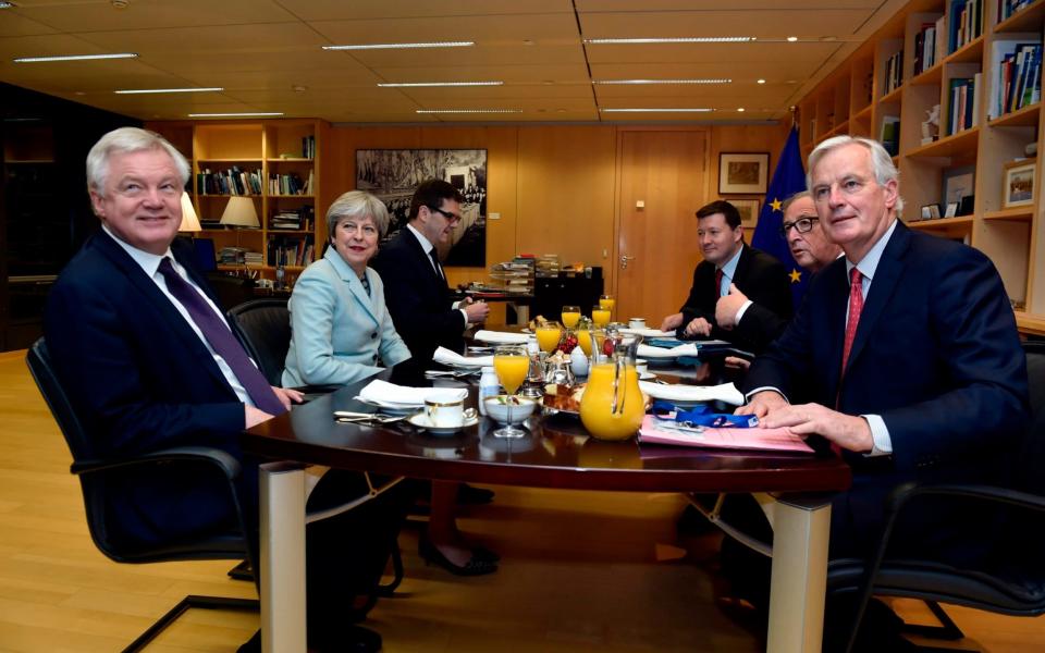 Happier times: Britain's Secretary of State for Exiting the European Union David Davis (L), Britain's Prime Minister Theresa May (2-L), European Commission President Jean-Claude Juncker (2-R) and European Union's chief Brexit negotiator Michel Barnier - AFP