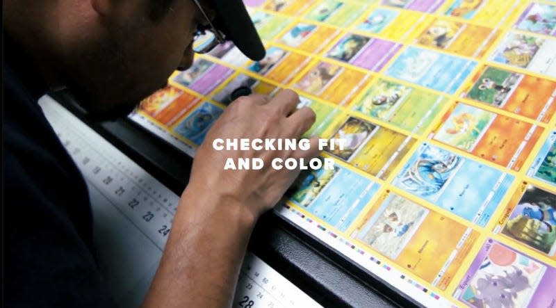 The Pokemon cards are checked for fit and color by a guy with a magnifying glass.