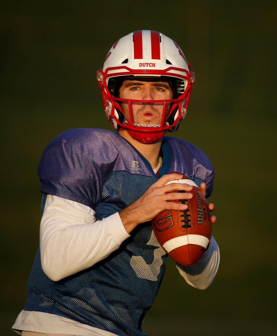 Central College quarterback Blaine Hawkins throws a pass during practice on Tuesday, Nov. 16, 2021, in Pella. Hawkins, who is back this season after missing last year due to the COVID-19 pandemic, is having one of the best seasons of any quarterback in the nation at any level. 