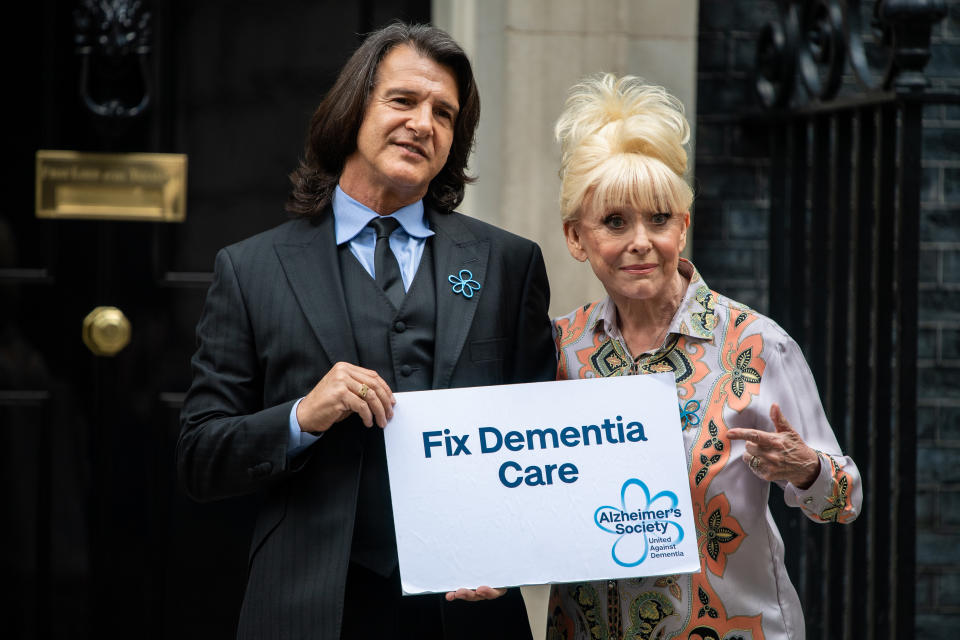 LONDON, ENGLAND - SEPTEMBER 02: Dame Barbara Windsor arrives at 10 Downing Street with her husband Scott Mitchell on September 2, 2019 in London, England. Barbara Windsor, who suffers from Alzheimers, met with the Prime Minister at 10 Downing Street to discuss dementia care. (Photo by Chris J Ratcliffe/Getty Images)