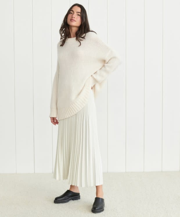 <em>Jenni Kayne Alpaca Cocoon Crewneck in Ivory, $295, </em><a href="https://rstyle.me/+52tXtrVsYmvpHzHO9UKItg" rel="nofollow noopener" target="_blank" data-ylk="slk:available here;elm:context_link;itc:0;sec:content-canvas" class="link ">available here</a><em>.</em><p>Photo: Courtesy of Jenni Kayne</p>